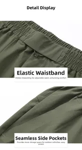 Detail of army green quick-dry shorts featuring elastic waist and heat-sealed zipper pocket