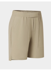 Detail of khaki quick-dry sports shorts showing elastic waistband and side split design