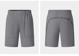 Vista anteriore e posteriore dei pantaloncini sportivi grigio scuro con elastico in vita