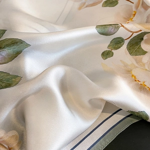 Silk square scarf with floral orchid print and emerald green leaves on smooth satin