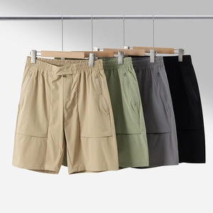 Pantaloncini sportivi uomo ad asciugatura rapida con tasche a zip e coulisse in vari colori