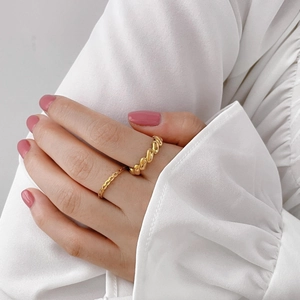 Minimalist gold olive leaf ring set with textured rope twist band for women
