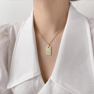 Checkboard zircon rectangle pendant necklace in gold plating worn on model