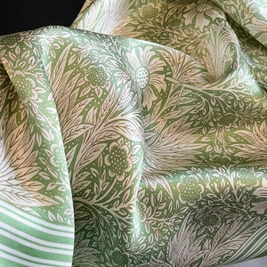 Elegant mulberry silk square scarf with light green floral patterns and striped borders