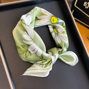 Elegant 53cm silk scarf with white daisy floral patterns on a light green satin background