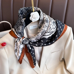 Silk-like satin square scarf with black white rose print on beige blazer suit