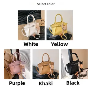 Selectable colors of the PU leather bucket bag with cute bear charm and strap buckle