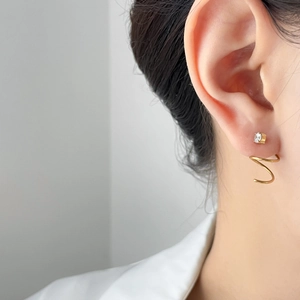 Elegant gold spiral stud earrings with zircon and small pearl details for women