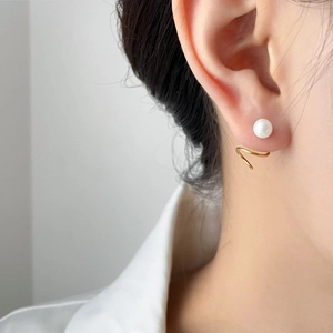 Elegant gold spiral pearl earrings for women with minimalist zircon stud design