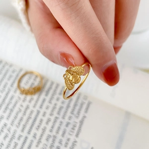 Minimalist 18K gold-plated stainless steel ring with bee and hollow lotus design