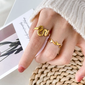 Minimalist gold seagull and leaf branch rings for women in a stackable style