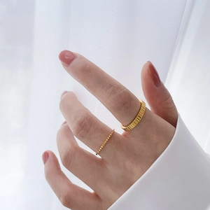 Gear design 18K gold plated titanium steel stackable rings with vertical ribbed texture