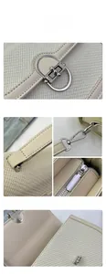 Detailed view of beige patchwork handbag with silver D-buckle and premium fabric texture