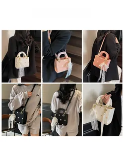 Lace embroidery handbag with daisy floral patterns and delicate pearl bow charms