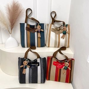 Chic large-capacity striped canvas tote bag with rabbit pendant in four stylish colors