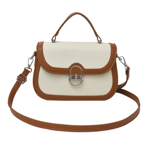 Retro patchwork woven crossbody bag with brown leather trim and silver metal ring buckle