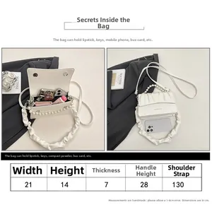 Size chart and dimensions for the white pleated crossbody bag with pearl handle