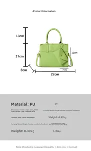 Detail view of light green PU leather handbag with size specs and adjustable strap