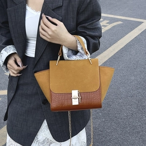Vintage winged crossbody bag in yellow suede and brown croc-effect leather with gold clasp