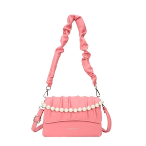 Pink pleated crossbody bag featuring elegant faux pearl beads and dual carry straps