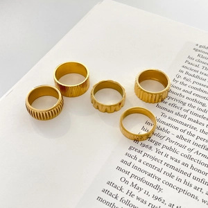 5-piece set of 18K gold-plated titanium steel rings with gear and bark texture patterns