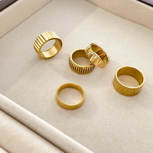 Five-piece 18K gold-plated titanium steel ring set with unique gear and bark texture