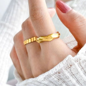 18K gold plated titanium steel rings set with textured fish scale and wave twist patterns