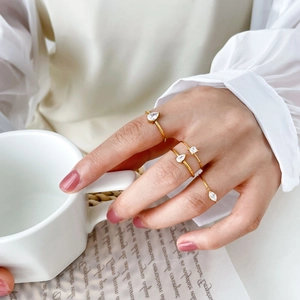 Ensemble de bagues empilables en titane plaqué or 18K avec zircons poire et carrés