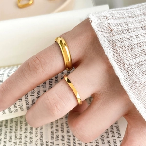 Polished 18k gold plated stainless steel dome ring and faceted geometric band set