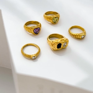Set of vintage 18K gold plated titanium rings with heart-shaped zircon stones