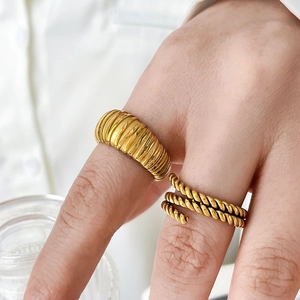 Twisted rope and ribbed texture gold stackable rings in 18K plated stainless steel
