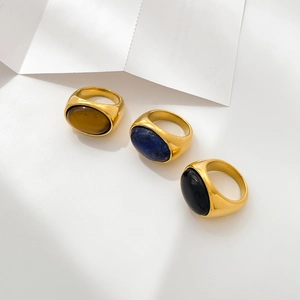 Polished 18K gold plated rings featuring oval tiger eye, lapis lazuli and black agate stones