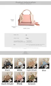 Detail view of stylish square handbag with silk scarf handle and metal lock closure