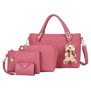 Pink 4-piece handbag set with embossed tote, chain crossbody, clutch and card holder