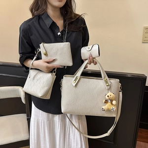 Chic 4-piece cream white quilted tote set with crossbody bag and bear charm for women