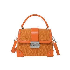 Elegant orange snake skin crossbody box bag with silver hardware and top handle