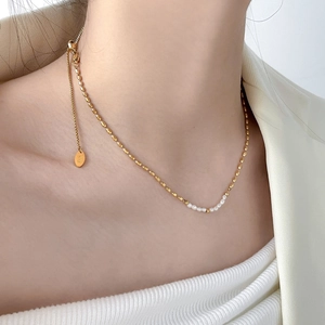 Layered 18K gold plated titanium necklace with freshwater pearls and oval pendant