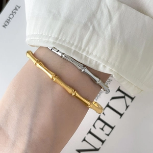 Minimalist chunky bamboo joint bangle set in polished gold and silver plated titanium steel