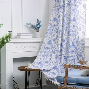 Nordic minimalist curtain with blue ocean patterns and elegant cream fringe tassels