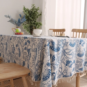 Linen boho tablecloth with blue horse patterns and fringe trim for dining table décor