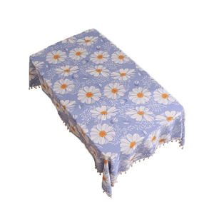 Purple linen tablecloth with white daisy floral prints and elegant tassel fringe edges