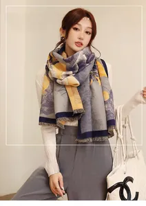 Detail of floral imitation cashmere scarf with short tassels for autumn and winter warmth