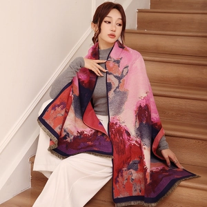 Detail of multi-color oil painting pattern and fringe edges on thick pashmina shawl scarf