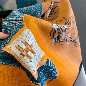 Thick cashmere-like scarf with orange and blue horse motifs and luxury chain patterns