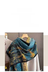 Detailed close-up of thick oil painting style scarf with artistic print and fringe edges