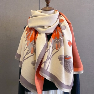 Thick floral cashmere-feel scarf with elegant orange blossoms and fringe detailing