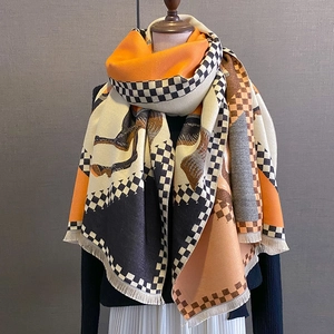 Orange equestrian print pashmina shawl with horse patterns and classic checkered borders
