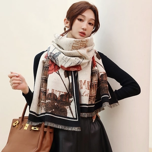 Detailed view of cashmere feel scarf with vintage rose floral prints and elegant fringe trim