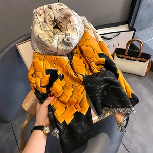 Thick geometric plaid scarf with yellow and grey squares and soft tassel fringe