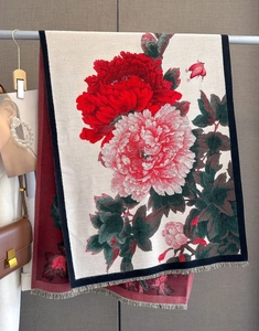 Close-up of vintage floral cashmere-like scarf featuring red peonies and fringe tassels